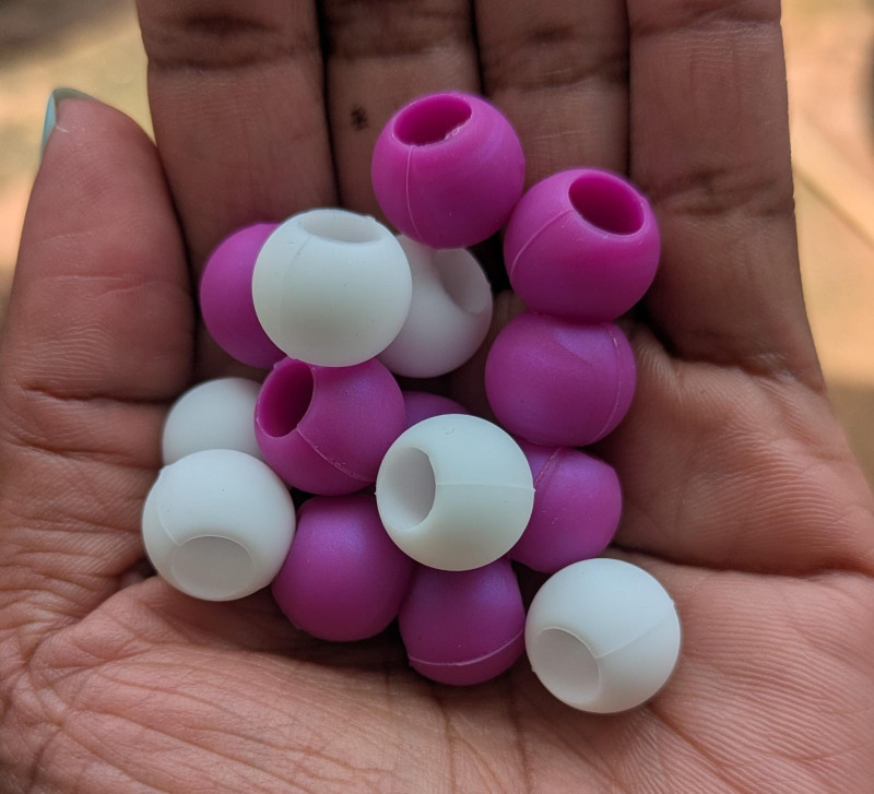 12 Dark Pink and 12 white beads.